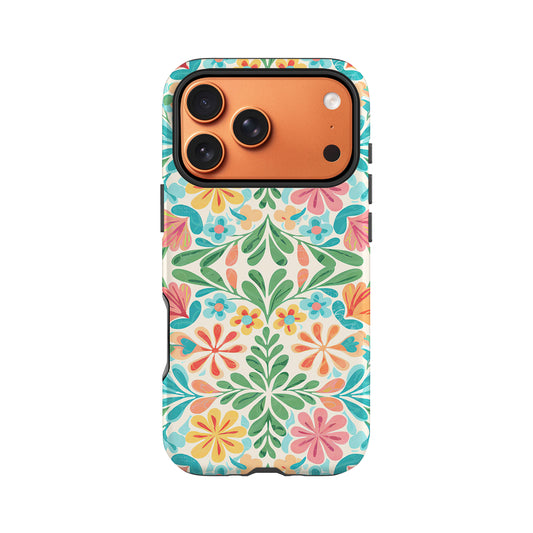 a colorful floral pattern on a phone case, with a camera lens design on the back.