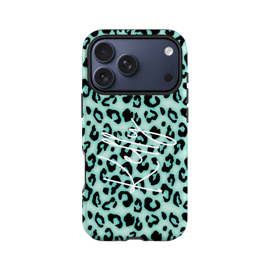 A turquoise and black leopard print case with a camera lens attached to the top.